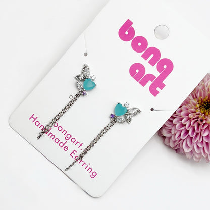 Radiant Emerald Heart Earrings