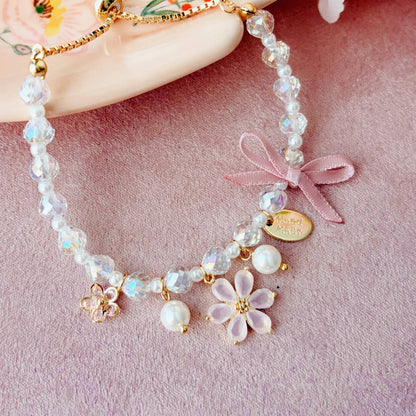Radiant Pink Flower & Bow Charm Bracelet