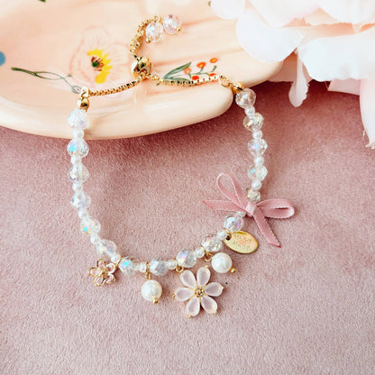 Radiant Pink Flower & Bow Charm Bracelet